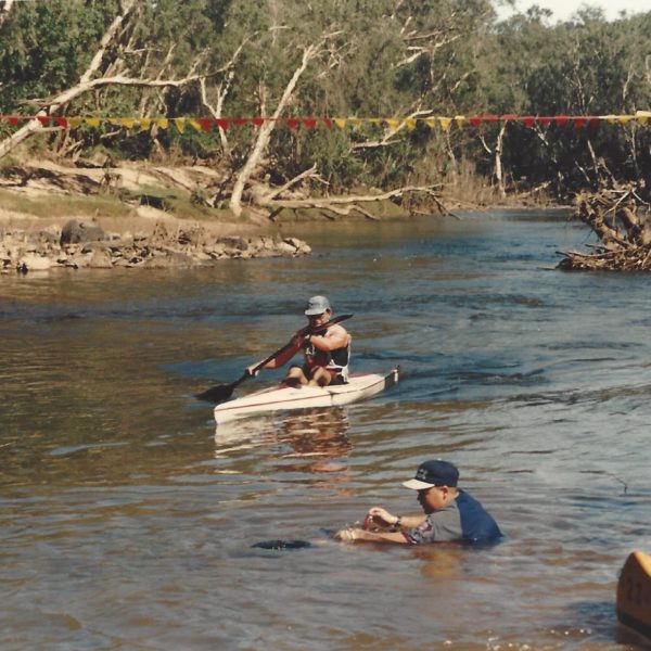 1994 Katherine Canoe Race Masters 1 TK1 Georgie Athanasiou Paddling Upstream across finish line 2nd Day
